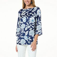 Jaclyn Smith Printed Woven Boat-Neck Tunic  Designed with a slightly longer tunic length for added layerability, this sleek boat-neck top is decorated with a vibrant print and finished with flattering 3/4-length bell sleeves. Elegant Floral Print Crew Neck Top, Elegant Crew Neck Top With Floral Print, Tunic Designs, Bell Design, Jaclyn Smith, Boat Neck Tops, Long Tunic, Draped Fabric, Tunic Length