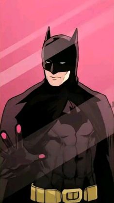 the batman standing in front of a pink background