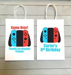 two bags with game over designs on them