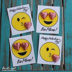 three valentine's day cards with hearts in the shape of smiley faces on them