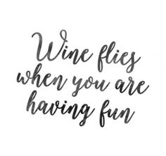 the words wine flies when you are having fun written in black ink on a white background