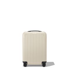 a white suitcase with black handles and wheels on the front, against a white background