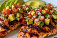 grilled chicken with avocado salsa on top