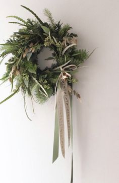 a green wreath hanging on the wall