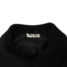 Miu Miu dress coat in black wool with a front double button closure, large pockets, and a belted waist with silver buckle hardware. Brand = Miu Miu Size = 36 Condition = 8/10, Very good. Some light pilling. Material = Wool SKU = 23643-9 Chic Luxury Miu Miu Outerwear, Luxury Miu Miu Outerwear With Pockets, Miu Miu Coat, Miu Miu Dress, Dress Coat, Sneaker Collection, Scarf Jewelry, Outerwear Sweater, Black Wool