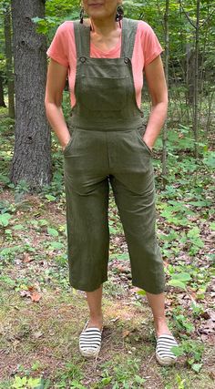 "I HAVE LISTED EACH COLOR AND COTTON WEIGHT IN THEIR OWN LISTING. If you can't find the color you're looking for please let me know. This listing is now for Olive Green only. Bib Overall Rompers with a cropped pant leg that hangs from mid calf to ankle depending on your height and proportions. Made in collaboration with Fair Trade artisans in Nepal - Conscious Clothing made with love. - Olive Green - Dark army green with a tweedy weave incorporating black threads. - A relaxed fit with comfort in Green Fall Overalls With Pockets, Green Cotton Shortalls With Pockets, Khaki Overalls For Fall, Fall Season Khaki Overalls, Khaki Fall Overalls, Green Bib Front Jumpsuit With Pockets, Green Bib Front Overalls With Pockets, Green Jumpsuit With Pockets And Bib Front, Green Overalls For Fall