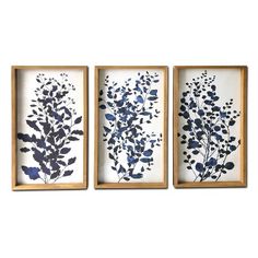 three framed art pieces with blue flowers in them