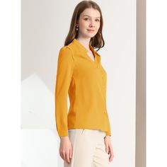 This shirt is elegant and charming for workwear or a day-to-night look, with a cut-out v-neck and unique shoulder details. No-see-through chiffon fabric and stylish v-neck make it a perfect choice for work, office, and daily wear. Pair this work office shirt with a pencil skirt, work pants, or casual jeans. The return of a classic, this button-up shirt is cut from in a chiffon sateen in an always flattering fit-and-flare silhouette. Model Body Size: Height: 5'9", Chest: 33 inches, Waist: 24 inch Solid Collared Office Blouse, Office Blouse With Collared Neckline In Solid Color, Solid Collared Blouse For The Office, Semi-formal Solid V-neck Top, V-neck Office Lady Shirt For Office Wear, Office Lady V-neck Shirt For Office Wear, Office Lady V-neck Shirt, Office Wear V-neck Shirt For Ladies, Collared Blouse For Office Wear