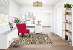 a living room with a leopard print rug and red chair next to a white desk