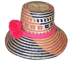 Introducing our exquisite Handmade Wayuu Hat crafted from the finest Iraca palm fiber by the skilled hands of the Wayuu tribe artisans from Colombia and Venezuela. Each hat is a masterpiece of tradition, taking approximately 8 hours to meticulously weave and shape. Constructed with precision, these hats boast a versatile design that can be adjusted to fit various head sizes, making them an ideal accessory for anyone. Whether worn fully down for optimal sun protection, styled with the front down Traditional Adjustable Sun Hat For Vacation, Traditional Curved Brim Beach Hat, Traditional Fedora Sun Hat For Beach, Artisan Handwoven Flat Brim Hat, Bohemian Handwoven Panama Hat, Bohemian Handwoven Toquilla Straw Panama Hat, Traditional Flat Brim Sun Hat For The Beach, Traditional Brimmed Sun Hat For The Beach, Traditional Flat Brim Straw Hat For The Beach