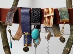 "Leather bracelets with bead, chain and charm accents, all with lobster clasp and adjustable. Smallest sizes shown below but adjust up to another 1.5\" if wanted. -aged brown on bronze, 8\"x.75\" -soft blue on gold, 7.5\"x.75\" -textured black on silver, 8\"x.75\" -green and white on gold, 7\"x.75\" -Brown and white in silver, 7.75\"x.75\"" Fun Bracelet, Braided Bracelets, Chain Link Bracelet, Chain Bracelet, Leather Bracelet, Jewelry Bracelets, Braids, Charm Bracelet, Beaded Bracelets