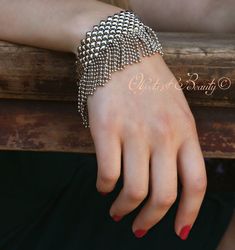 Flirtatious Flapper SG Liquid Metal Bracelet | Sergio Gutierrez - Objects of Beauty Adjustable Ball Chain Jewelry For Party, Fringe Bracelet, Metal Choker Necklace, Jewelry Necklace Simple, Bridal Cuff, Metal Choker, Liquid Silver, Chain Fringe, Liquid Metal