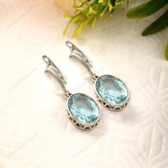 Aquamarine Earring    Large Oval cut Aquamarine dangle, Ocean blue gemstone drop earrings, gift for her, gift for mom, March birthstone,925 Sterling Silver Dangle  teardrop  created Gemstone earrings gemstone-10x14mm <> Some basic benefits of wearing Aquamarine Gemstone: Attracts money. Brings good fortune. Financial abundance. Protects from negative energies. Cleanses all evil thoughts. Stability in married life. Improves communication. Boosts self-confidence. FREE SHIPPING AND USPS TRACKED PARCELS WORLDWIDE. Our products are totally handmade and made with high quality gemstones and 925 solid sterling silver If you believe in buying top quality products for yourself and for your family and friends, SE is the place where you want to be There are unique pieces, handcrafted to perfection wit Anniversary Topaz Gemstone Earrings, White Gold Topaz Gemstone Earrings, Silver Topaz Birthstone Earrings, Silver Blue Topaz Drop Earrings, Elegant 925 Stamped Drop Earrings, Elegant Drop Earrings Stamped 925, Blue Topaz Gemstone Earrings For Anniversary, Silver Topaz Dangle Earrings, Anniversary Blue Topaz Gemstone Earrings