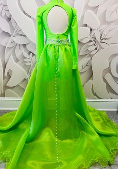 Gorgeous unique neon green romper with  organza runway  skirt  and feathers cuffs . Belt and neck are decorated with sparkly gems. Skirt and sleeves are decorated with original buttons. Outfit included romper, skirt,  wrist cuffs. Zipper back.                                                                 Can  be made special for your little girl in any size and different colors For custom outfit we would need: chest, waist, hips, full height, length from shoulder to waist,  length from waist t Green Fitted Dress For Pageant, Fitted Green Dress For Pageant, Fitted Green Pageant Dress For Wedding, Glamorous Green Dress For Costume Party, Organza Runway, Neon Green Outfit, Buttons Outfit, Neon Green Outfits, Runway Skirt