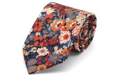 About This Item: Feeling flirtatious? Good for you! According to research, flirting is healthy and a powerful tool to boost your confidence and overall well-being. Crafted from fine British cotton, our Flirty Fall Floral Necktie is guaranteed to raise your feel good factor and might just lead to a date! At the very least, this floral tie will set the tone and add some warmth to your ensemble. 100% cotton 3 1/4 inches width 58 inches length Handmade in North Carolina If you are not completely sat Boho Wedding Groom, Thanksgiving Dinner Outfit, Earth Tone Wedding, Floral Necktie, Ties Mens Fashion, Floral Bow Tie, Fall Attire, Boho Fall, Wedding Ties