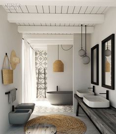 a bathroom with two sinks and mirrors on the wall next to a rug in front of it