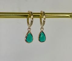 Emerald green gold plated drop hoop earrings Gold plated brass earrings Hoop size approximately 14mm Charm size 13mm x 7mm Every item comes in our frosted travel pouch  Gift wrap pouch & box set available, also sold separately Green Drop Huggie Earrings, Green Teardrop Nickel Free Hoop Earrings, Green Teardrop Nickel-free Hoop Earrings, Green Teardrop Hoop Earrings, Nickel-free Green Teardrop Hoop Earrings, Green Teardrop Hoop Earrings For May Birthstone, Gold Teardrop Hoop Earrings With Emerald, Gold Teardrop Hoop Earrings For May Birthstone, Earrings Small Hoops