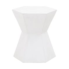 a white ceramic table with an octagonal shape