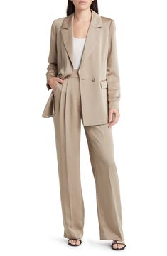 Chic for the office or a night out, these wide-leg trousers are fashioned from smooth woven fabric and pleated at the superhigh waist to further the flowy fit. 32" inseam; 20" leg opening; 13 1/2" front rise; 16" back rise (size 8) Zip fly with hook-and-bar closure Front slant pockets; back welt pockets 100% polyester Machine wash, tumble dry Imported Chic Silk Wide Leg Pants For Formal Occasions, Chic Silk Wide Leg Formal Pants, Chic Formal Viscose Pants, Chic Silk Wide Leg Pants For Work, Viscose Wide-leg Pants For Formal Occasions, Elegant Viscose Wide Leg Pants For Work, Silk Wide Leg Pants With Pressed Crease, Formal Viscose Wide-leg Pants, Elegant Viscose Bottoms For Workwear