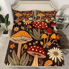 a bed with mushrooms and flowers on it