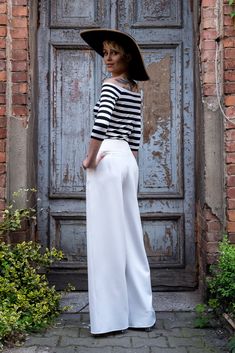 Elegant high-waisted wide leg trousers. Side-seam hidden zipper. Simply elegant culottes! Pair it with our lace over-skirt for extremely romantic, but still comfortable look! You can also wear them for casual outfits. You can also buy lace over-skirt separately. Its is made upon request, so we need 14 days to make and ship. SIZING in centimeters: XS: waist 64, hips 96, length 95 S: waist 68, hips 100, length 95 M: waist 72, hips 104, length 95 L: waist 76, hips 108, length 95 XL: waist 80, hips Lace Palazzo Pants, Elegant Backless Dress, Wedding Bodysuit, Bridal Pants, High Waisted Culottes, Bridal Bodysuit, Elegant Trousers, Wedding Pants, Pants Elegant