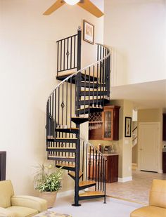 there is a spiral staircase in the living room