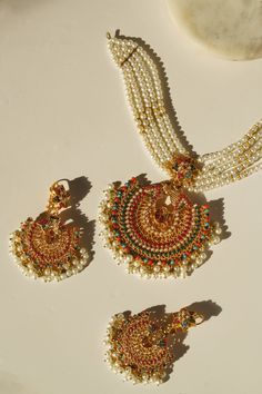 Imaari Statement Necklace Set - Multicolor navratan stones with gold plating Festive Multicolor 22k Gold Bridal Necklace, Gold Plated Meenakari Jewelry For Puja, Gold Plated Meenakari Temple Necklace Chandbali, Gold Plated Meenakari Temple Necklace In Chandbali Style, Gold Plated Meenakari Temple Necklace In Chandbali Shape, Bollywood Style Chandbali Gold Plated Temple Necklace, Gold Plated Chandbali Necklaces For Festivals, Multicolor 22k Gold Kundan Temple Jewelry Necklace, Multicolor 22k Gold Kundan Necklace For Celebration