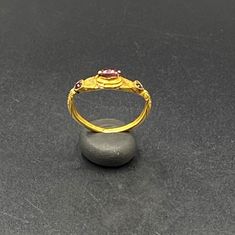 The Beautiful Antique Gold Ring Probably From South East Regions. Beautiful Garnet Gems Stone Is Place In The Ring. Size Details Pictures Are Listed Above. The Size Of This Ring Is USA 12. The Weight Is 4.34 Grams. 18 karat Gold .Test Certificate Available On Request Of Customer. Free And Fast Shipping World Wide. Traditional Oval Ring With 17 Jewels, Traditional Gold Oval Ruby Ring, Traditional Ruby Ring In Yellow Gold, Traditional Oval Ruby Ring In Gold, Traditional Multi-stone Oval Rings, Traditional Oval Multi-stone Rings, Ceremonial Yellow Gold Ruby Ring, Luxury Gold Ruby Ring With Accent Stones, Heirloom Yellow Gold Rings With Stone Setting