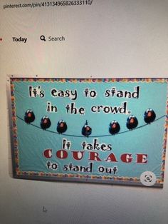 a computer screen with a sign on it that says it's easy to stand in the crowd if takes courage to stand out