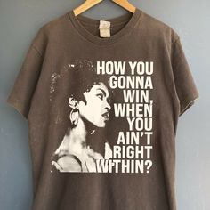 How you gonna win when you ain't right within, Lauryn music Hill, Lauryn T-shirt , Lauryn concert , Lauryn  fans Gift for men women t-shirt ABOUT MATERIAL: Comfort Colors® 1717 Made with medium fabric (6.1 oz/yd² (206.8 g/m consiting of high quality, 100% ring-spun US cotton for long-lasting comfort. The relaxed fit keeps the wearer comfy in both casual and semi-formal settings while the crew neckline delivers that classic, neat style which makes it perfect for accessorizing. What's more, the pr Lauryn Hill Shirt, Lauryn Hill Style, Outside Concert Outfit, Graphic T Shirt Outfit, Cute Shirt Designs, Movie T Shirts, Neat Style, Tshirt Design, Women T Shirt