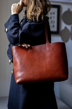 This handmade leather bag is made with 100% natural full grain leather which is tanned with all natural materials. There is no chemical materials in this leather. This bag is handmade in our studio in Milan. The lining is 100% cotton and it is easy to clean. The bag has one middle divider which is a big zipped pocket. There is One smaller zipped pocket in one side All the bags will come with a cotton dust bag which can protect the leather and bag when it is not in use. In options u can find Prot Luxury Vegetable-tanned Tote Shoulder Bag, Elegant Brown Leather Backpack With Soft Leather, Elegant Brown Leather Backpack For Everyday, Elegant Everyday Shoulder Bag In Vegetable Tanned Leather, Luxury Everyday Vegetable-tanned Bags, Elegant Leather Backpack With Smooth Grain For Everyday, Vegetable Tanned Leather Satchel With Leather Lining, Elegant Everyday Leather Backpack With Smooth Grain, Modern Vegetable-tanned Leather Bag