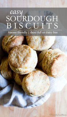 a pile of biscuits sitting on top of a white cloth