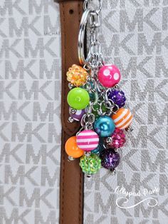 a close up of a key chain on a bag