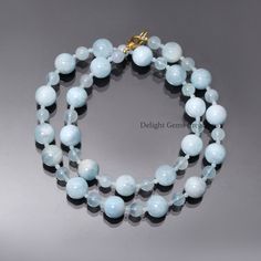 PRODUCT DETAIL : ITEM : AQUAMARINE BEADED NECKLACE ITEM CODE : DGC4103 ITEM NAME :NECKLACE GEMSTONE : BLUE AQUAMARINE BEADS SHAPE : SMOOTH ROUND LENGTH : 18 INCH APPROX BEADS SIZE: 2mm/6mm/10 mm APPROX WEIGHT : 214 Cts. APPROX CUSTOMIZATION/BULK ORDER : AVAILABLE PLEASE FEEL FREE TO CONTACT IF YOU REQUIRE ANY FURTHER INFORMATION. Light Blue Jewelry With Natural Round Beads, Aquamarine Gemstone Round Bead Necklaces, Aquamarine Necklaces With Round Beads Of Natural Stones, Aquamarine Gemstone Necklaces With Round Beads, Aquamarine Gemstone Beaded Necklace, Aquamarine Necklace With Round Natural Stone Beads, Aquamarine Necklace With Natural Round Beads, Aquamarine Necklace With Round Natural Stones, Light Blue Gemstone Round Beads Jewelry