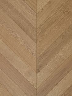 an image of wood flooring that looks like chevrons