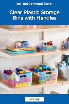 plastic storage bins with handles for children's toys and books on the shelf