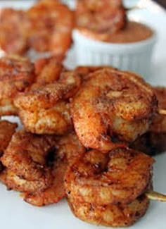 some fried food is on a white plate