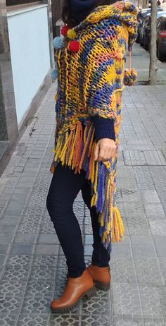 "Welcome! This beautiful sweater poncho is made of high quality blend wool fabric It's soft, lightweight warm and cozy with cool design! Its really amazing and is in very good condition! The measurements ( approximately ): width: 33.07\"= 84 cm Height : 44.48\"= 113 cm Thanks for stopping by!!IMPORTANT: Due to the delicate situation We're all going through, and in order to keep the safety of courier workers too, all orders will be dispatched when alert sanitary finished. You can purchased or res Multicolor Winter Poncho, Multicolor Alpaca Winter Cape, Luxury Multicolor Poncho, Cozy Multicolor Poncho, Multicolor Poncho For Spring, One Size, Cape With Hood, Sweater Poncho, Bohemian Jackets, Boho Coat