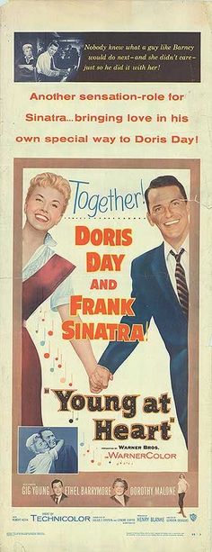 an old movie poster for young at heart with two men in suits and ties shaking hands