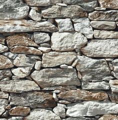 an old stone wall with no mortar or mortar, it is very nice to use as a background