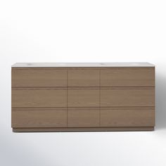 an image of a modern dresser with drawers on the front and side panels that are made from wood