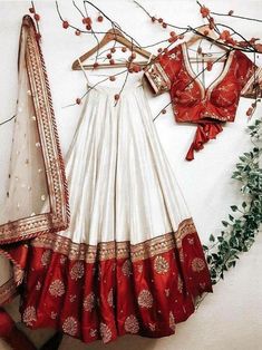 👉Send contact number on order its Needed for ship item 👉 Choli Fabric Choli Fabric : Taffeta Silk With Embroidery Work Choli Color : Red Choli Material size :0.80 Meter Lehenga Flair : 3 Mtr Lehenga Length : 44 Inch Lehenga Color : Red & White Lehenga Fabric : Soft Taffeta Silk Has Dupatta :Yes Dupatta Fabric : Heavy Nylon Net With Sequence Work Work :Embroidery Work Stitching :Semi Stitch Package Contains: 1 Semi-Stitched Lehenga with Dupatta and Un stitched Blouse What is semi-stitched ? White Lehenga Choli, Red Lehenga Choli, Blouse Lehenga, Lehenga Choli Designs, Sabyasachi Lehenga, Saree Bollywood, Indian Outfits Lehenga, Organza Lehenga, Wedding Dress Outfit