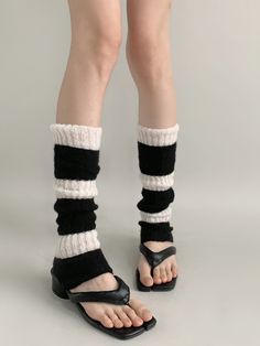 Stay cozy and stylish with our 3 color options knit leg warmers. These versatile leg warmers come in three beautiful colors to match any outfit. Whether you're pairing them with boots, leggings, or skirts, these leg warmers are the perfect accessory to complete your look.   Please note that this product includes one pair of leg warmers only. Choose your favorite color and step up your fashion game with these trendy leg warmers. Casual One Size Acrylic Socks, Trendy Knitted One Size Socks, Trendy Knitted One-size Socks, Cozy Elastic Leg Warmers For Fall, Elastic Knit Leg Warmers For Fall, Thigh High Cozy Leg Warmers, Trendy Knitted Acrylic Leg Warmers, Casual Black Knit Leg Warmers, Cozy Thigh-high Leg Warmers