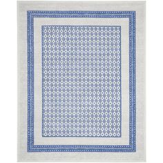 a blue and white rug with an intricate design