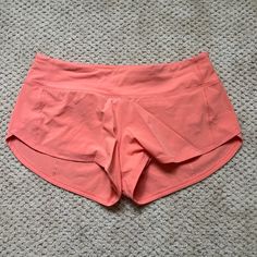 Super Cute And Never Worn Lululemon Shorts. They Have A 2.5 Inch Inseam And They Are Low Waisted. Let Me Know If You Have Any Questions. They Come From A Smoke Free Home! Pink Activewear Shorts With Pockets, Pink Sports Shorts With Pockets, Pink Activewear With Built-in Shorts For Beach, Pink Short Activewear With Pockets, Pink Workout Activewear With Pockets, Pink Activewear With Pockets For Workout, Pink Workout Athletic Shorts With Pockets, Pink Athletic Shorts With Pockets For Workout, Pink Sporty Athletic Shorts With Pockets