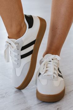 Stride in style with our Striped Lace Up Flat Sneakers! These trendy and comfortable sneakers feature a striped design and lace-up closure, perfect for adding a touch of flair to any outfit. You'll love the combination of fashion and functionality in these must-have shoes! Size Chart (INCH) Sizes Foot Length 6(37) 9.3 7(38) 9.4 8(39) 9.6 8.5(40) 9.8 9.5(41) 10.0 10(42) 10.2 Sporty Lace-up Canvas Shoes, Sporty White Canvas Shoes With Elastic Laces, Sporty Lace-up Canvas Shoes With Elastic Laces, Sporty Canvas Shoes With Elastic Laces, Sporty Canvas Shoes With White Laces For Spring, Sporty Spring Canvas Shoes With White Laces, Sporty Lace-up Sneakers With Three Stripes, Sporty Striped Low-top Sneakers, White Lace-up Sneakers With Three Stripes