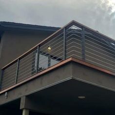 a large brown building with a balcony and balconies