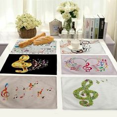 the table is covered with many different designs on it, including music notes and trebles