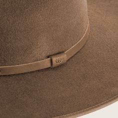 The Calloway is our best selling style and is crafted from 100% Australian wool, and trimmed with our signature premium matte leather band. It has a stiffened 7cm wide brim, finished with a grosgrain bound edge to help it last the extra mile. A crisp teardrop pinched crown provides a distinctive silhouette. Timeless and approachable, the wide brim tan fedora is perfectly suited to any adventure. Wide Brim Hat Outfit, Brim Hat Outfit, Neutral Tones Aesthetic, Hat Outfit Ideas, Paracord Belt, Wide Brim Felt Hat, William Black, Kids Hat, Mens Hats