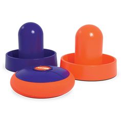 an orange and purple object sitting next to each other